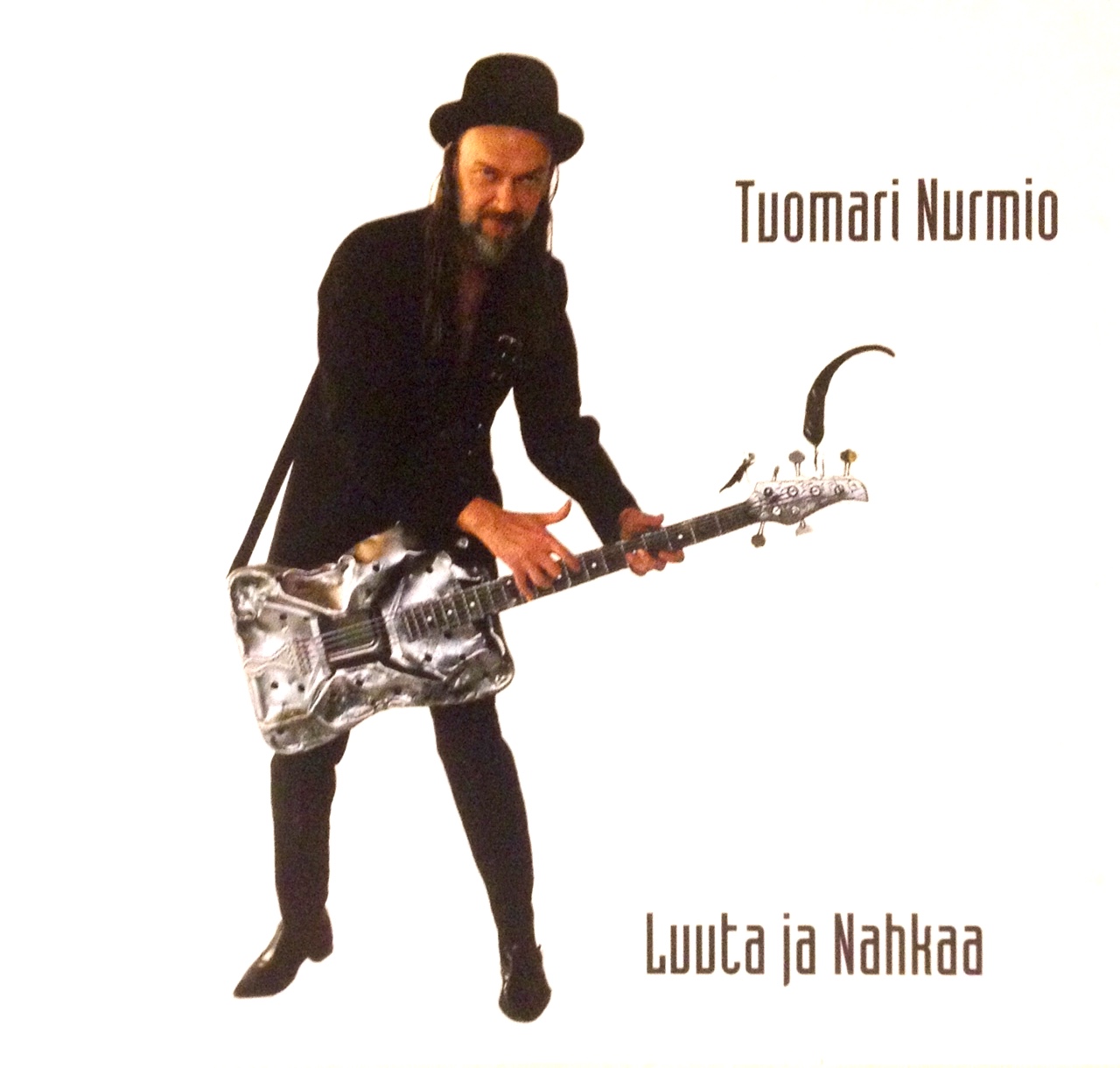 Tuomari Nurmio: Luuta ja nahkaa – koruton mestariteos