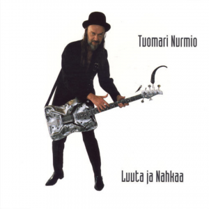 Tuomari Nurmio: Luuta ja nahkaa (Johanna Kustannus / Megamania 1997).