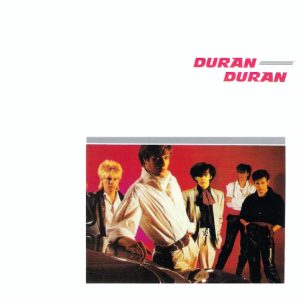 Duran Duran (EMI 1981). Kansitaide: Malcolm Garrett • Kuva: Fin Costello