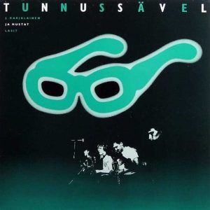 J. Karjalainen ja Mustat Lasit: Tunnussävel (Poko Rekords 1983). Kansitaide: Kai Kujasalo • Valokuvat: Riitta Sourander