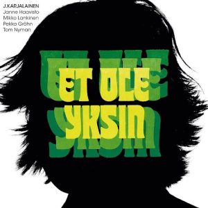 J. Karjalainen: Et ole yksin (Warner Music 2013). Kannen graafinen suunnittelu: J. Karjalainen & Janne Uotila. Et ole yksin -logo: Matti Mankin. Siluettikuva: Travis Manley